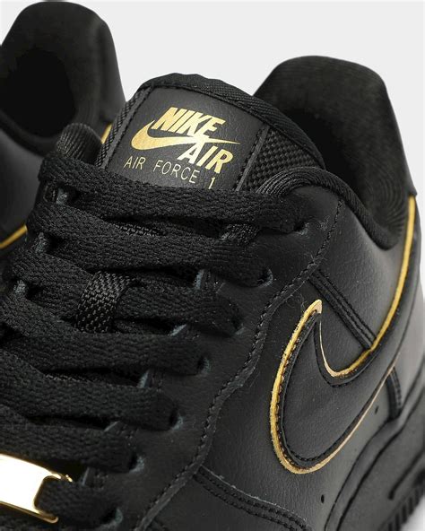 nike essential black gold